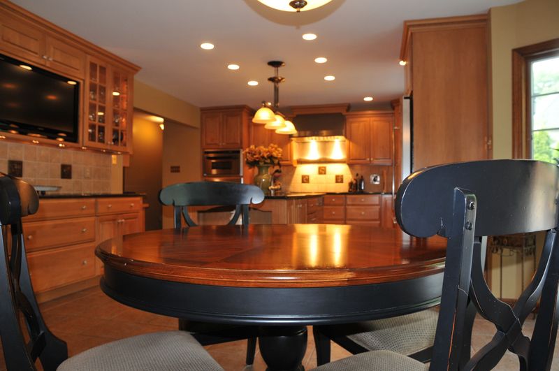 Round breakfast table in an open kitchen